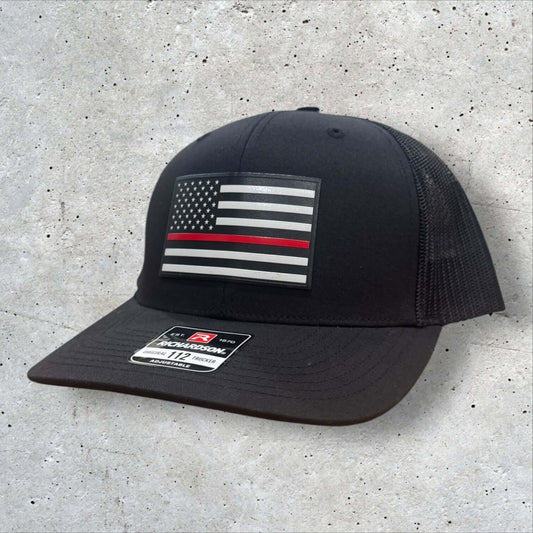 Thin Red Line Hat featuring an American flag patch on a black Richardson 112 snapback, showing support for firefighters.